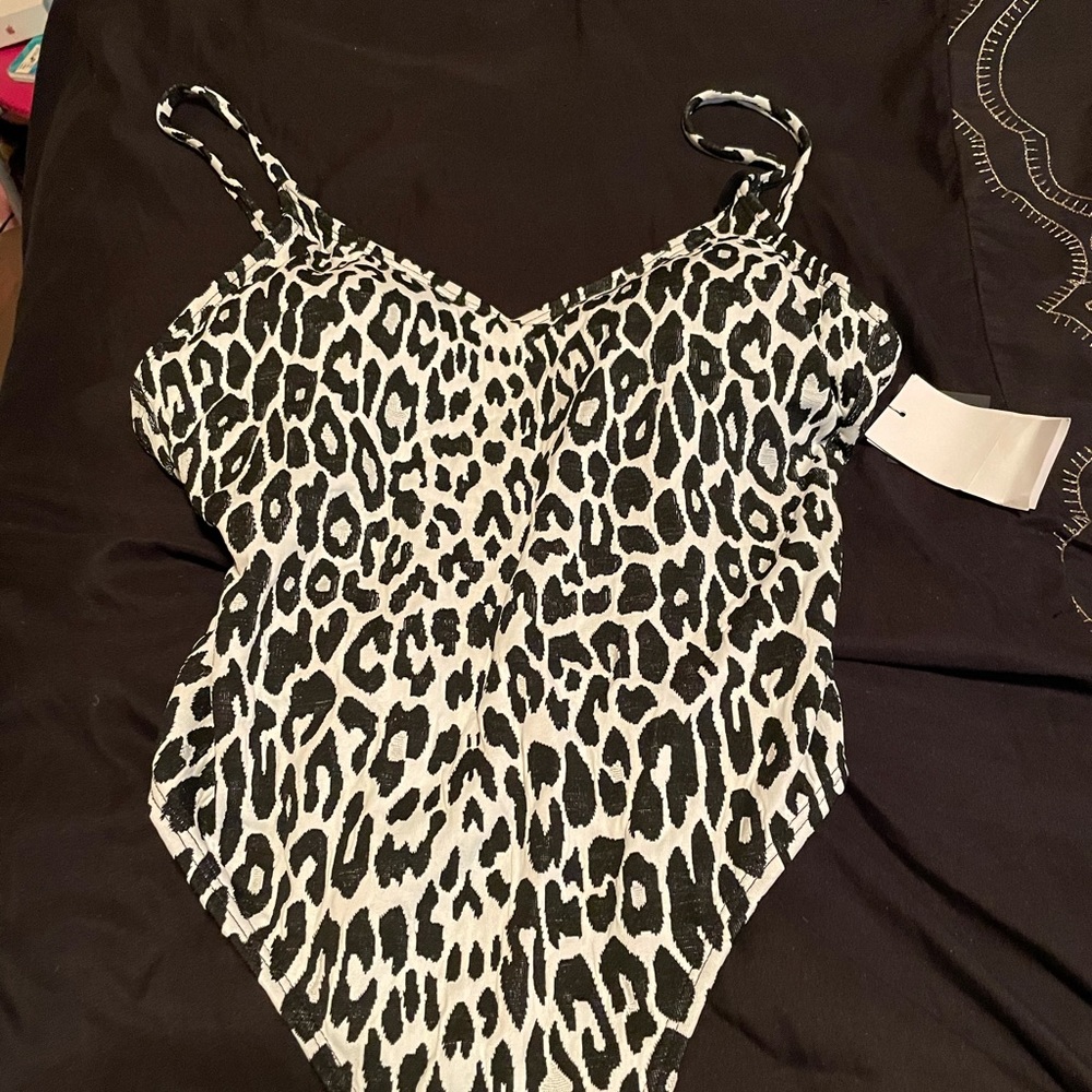 Brand new white leopard swim suit or bodysuit 💋